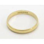 An 18ct gold ring. Approx 1.7g. Ring size approx L 1/2 Please Note - we do not make reference to the