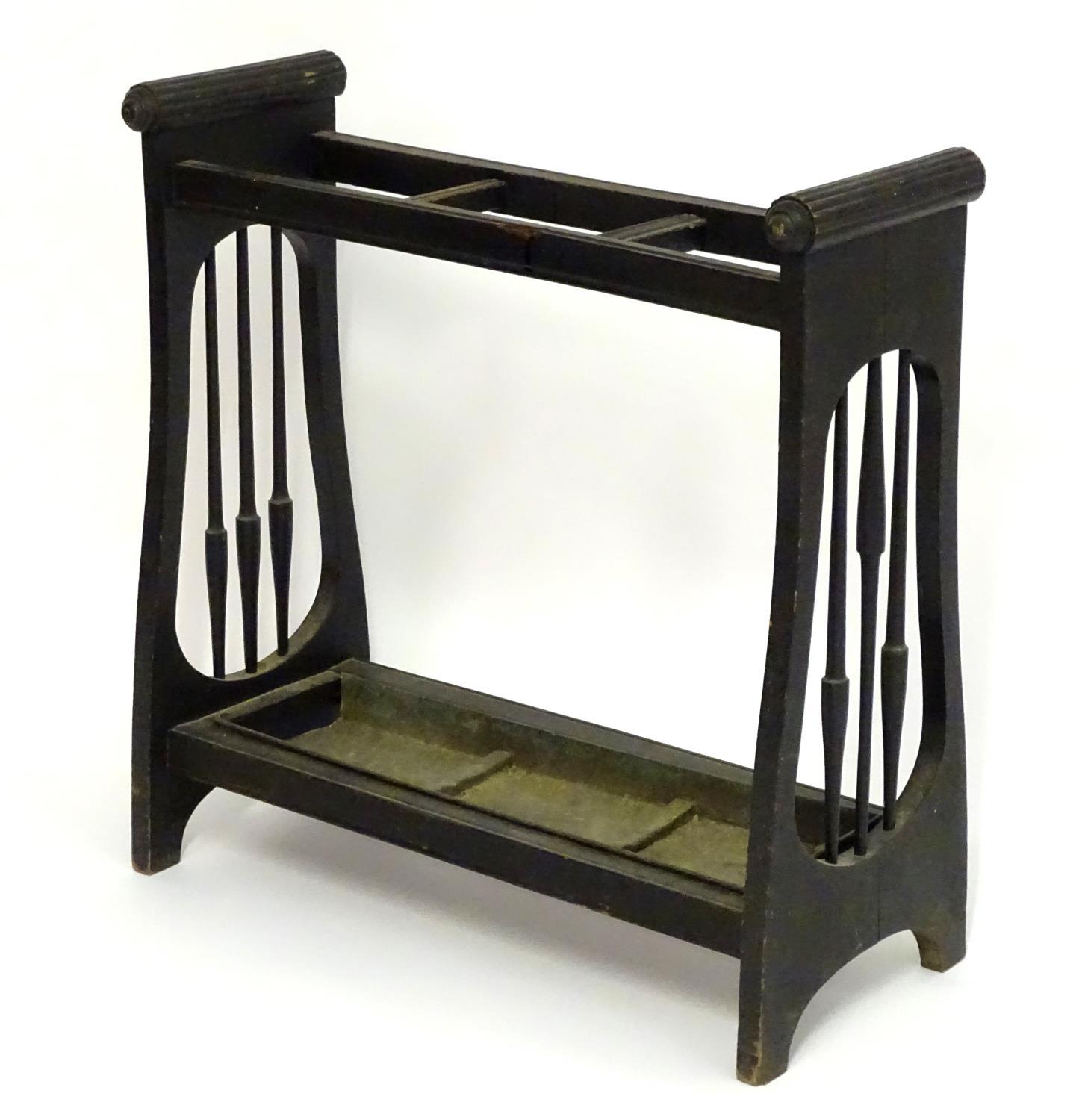 A 19thC Aesthetic movement stick stand with a three sectional centre, turned tapering spindles to - Image 5 of 5