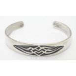 A 925 silver bangle with incised decoration. Bears maker?s mark CAO. Please Note - we do not make