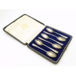 A cased set of 6 silver teaspoons Hallmarked 1924 maker Harrods Ltd. Approx 4 1/4" long Please