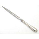 A silver handled letter opener / paper knife. hallmarked Sheffield 2007 maker Carr's of Sheffield