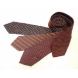 4 Gucci silk ties, in various designs of reds and blues (4) Please Note - we do not make reference