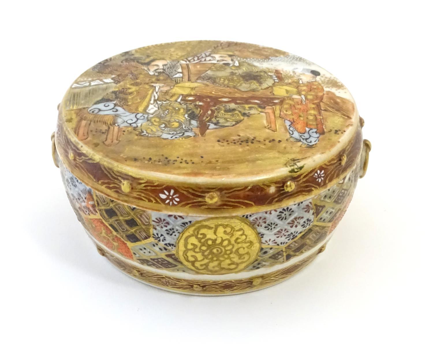 A Japanese Satsuma pot and cover. The cover decorated with a landscape scene with two scholar - Image 2 of 11