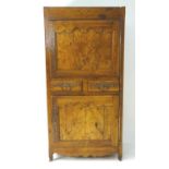 A mid 19thC walnut continental armoire with painted decoration, applied metalwork and having two