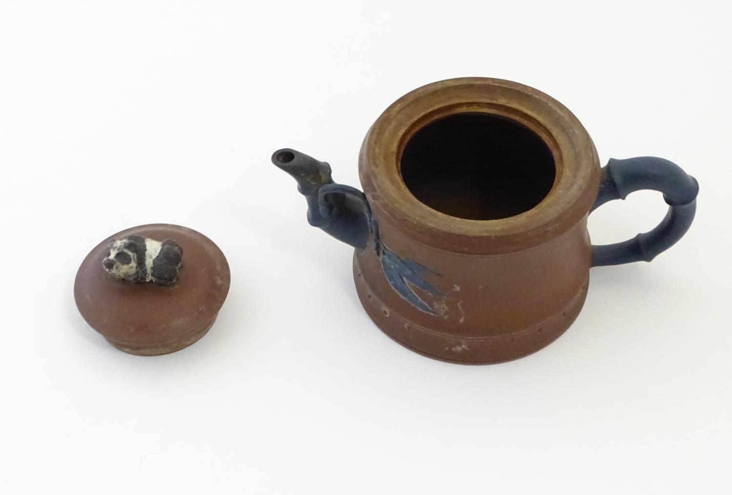 A Chinese clay teapot, the handle and spout modelled as stylised bamboo, the lid surmounted by a - Image 10 of 15