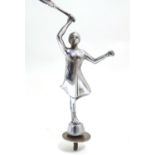 A 20thC chrome car mascot modelled as a female tennis player. Approx. 7 3/4" high overall Please