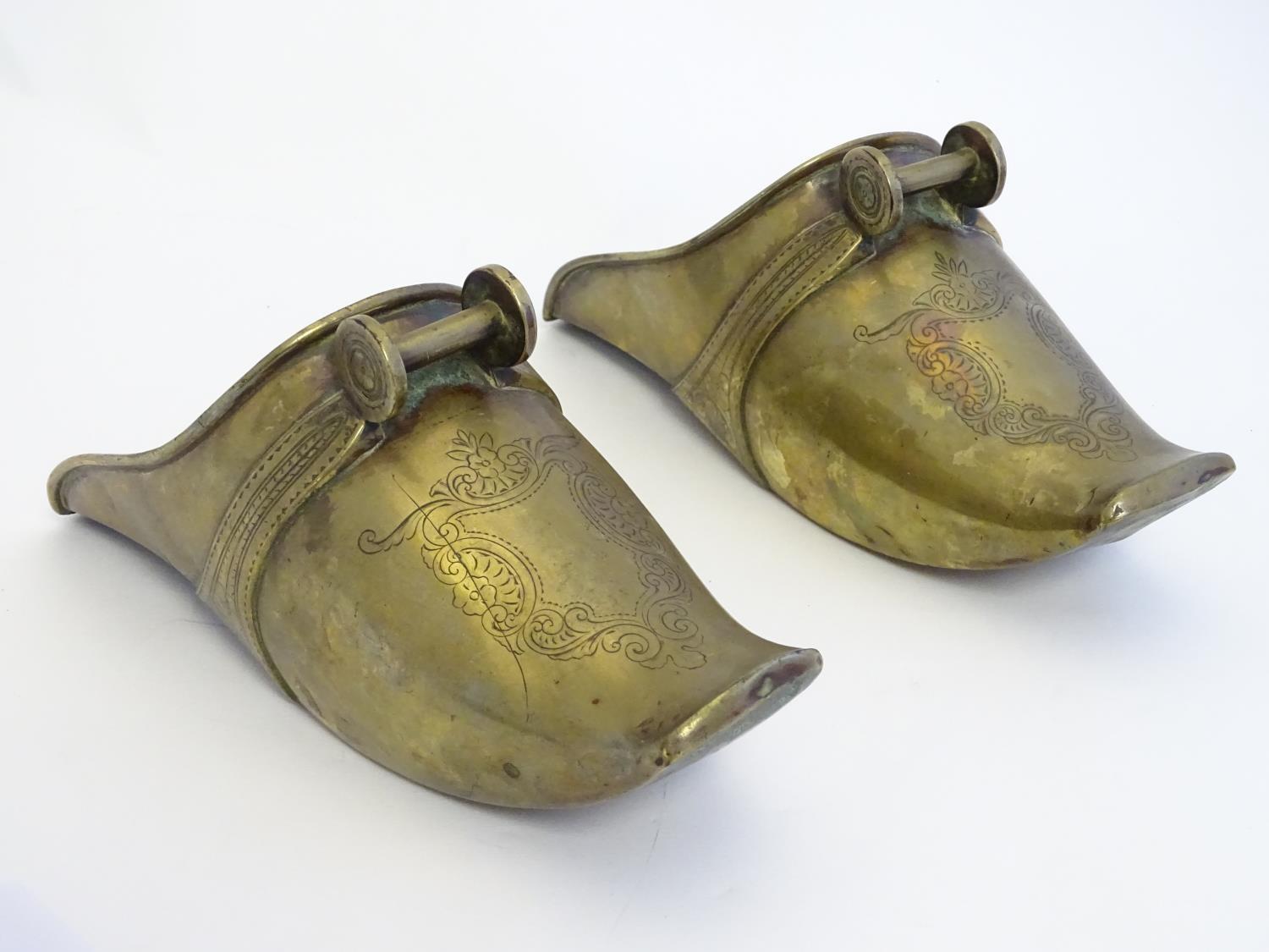 A pair of 19thC South American brass horse riding stirrup shoes with engraved decoration. Approx. - Image 4 of 5