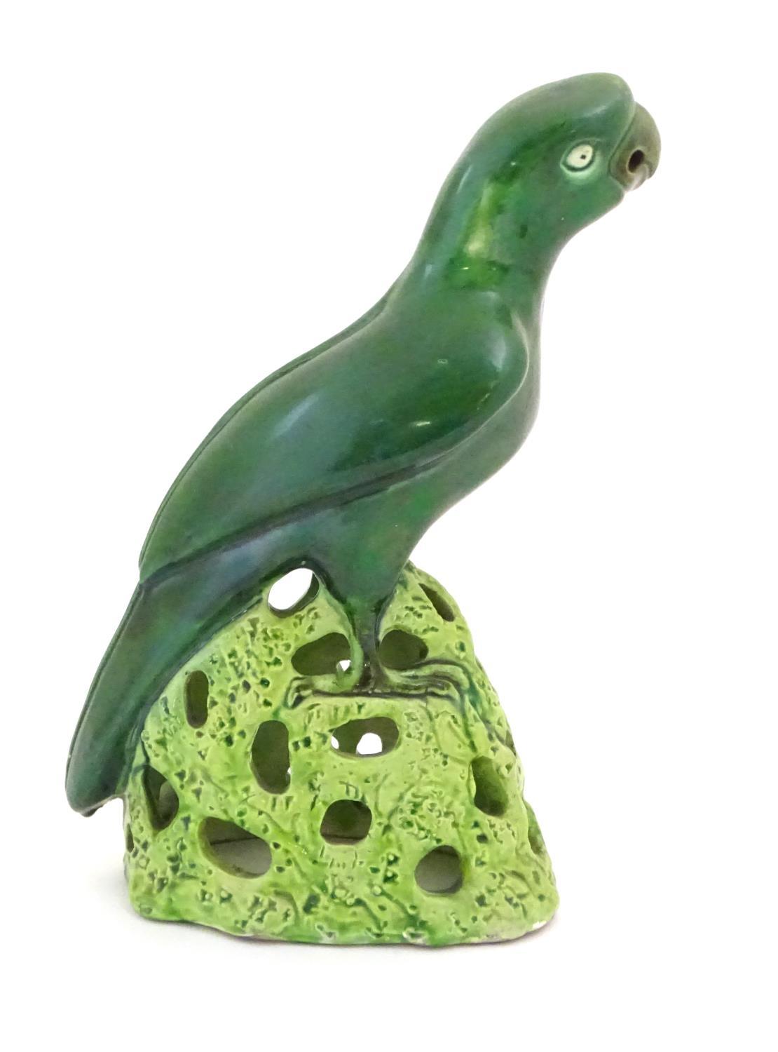 A Chinese model of a parrot with a green glazed on a pierced base. Approx. 12" high Please Note - we - Image 8 of 9