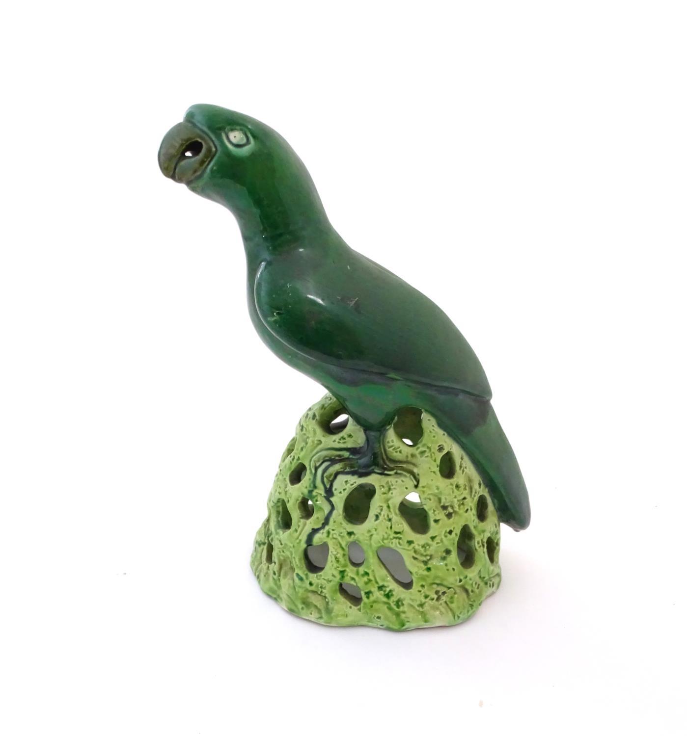 A Chinese model of a parrot with a green glazed on a pierced base. Approx. 12" high Please Note - we - Image 6 of 9