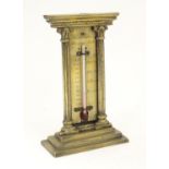 A late 19th / early 20thC brass table top thermometer with a fahrenheit scale within an