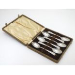A cased set of 6 silver teaspoons hallmarked London 1936 maker Josiah Williams & Co. Approx 4 3/4"