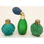 A green glass scent / perfume bottle with atomiser top together with two scent / snuff bottle with