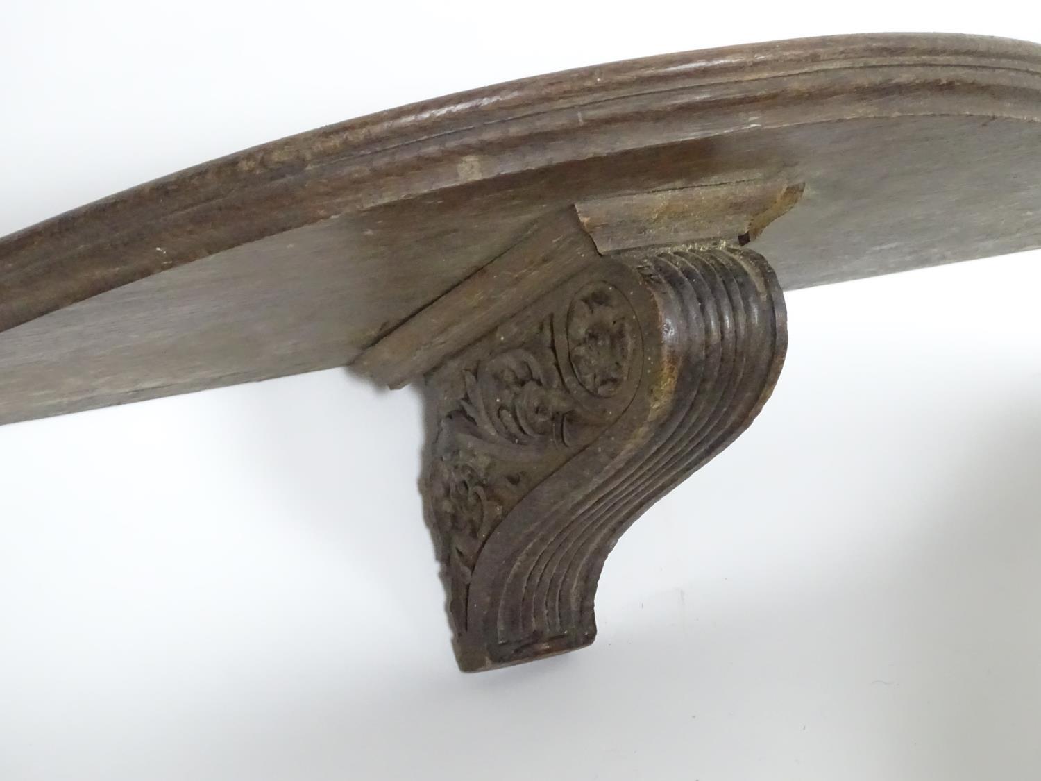 A pair of large 19thC oak wall brackets of serpentine form, each measuring 42" wide, 7 1/2" tall, - Bild 8 aus 8