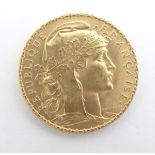 A French Republic 20 franc gold coin, 1914, approximately 6.5g Please Note - we do not make