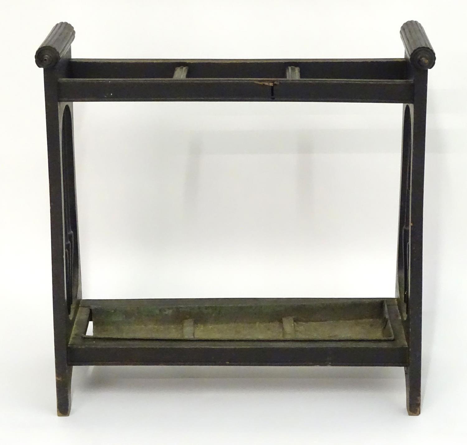 A 19thC Aesthetic movement stick stand with a three sectional centre, turned tapering spindles to - Image 3 of 5