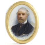 XIX, English School, Oil on board, An oval, A portrait of a man with a beard wearing a black jacket.