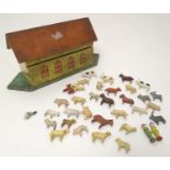 Toy: A late 19th / early 20thC wooden Noah's Ark with polychrome decoration. The flat bottomed ark