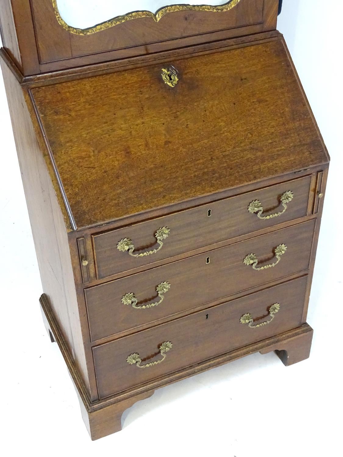 A Regency mahogany bureau bookcase with a moulded cornice above a dentil frieze and shaped - Bild 14 aus 14