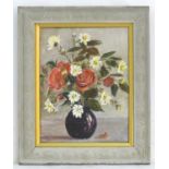 Manner of Marcel Dyf (1899-1985), Oil on canvas, A still life study of flowers, red roses and dog