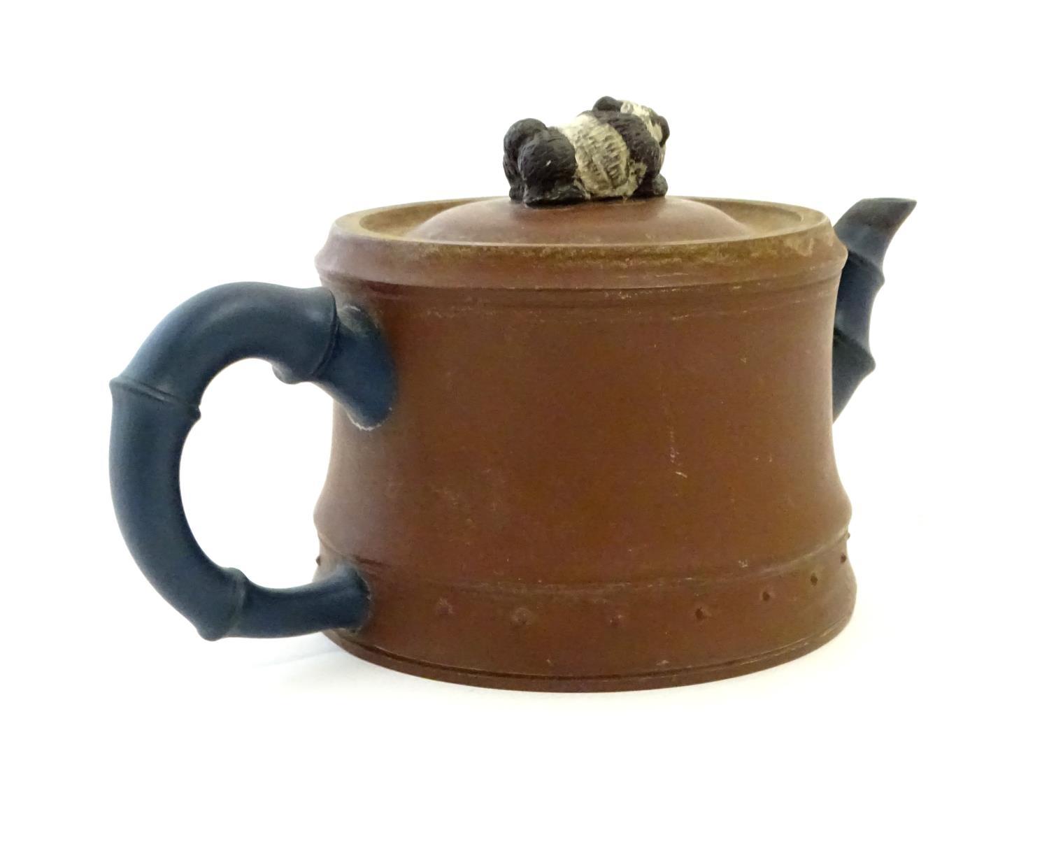 A Chinese clay teapot, the handle and spout modelled as stylised bamboo, the lid surmounted by a - Image 5 of 15