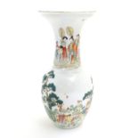 An Oriental baluster vase with an elongated neck and flared rim, the body decorated with figures and