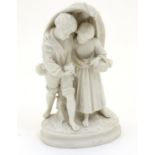 A Copeland style parian figural group modelled as two children, a boy holding a nest with two