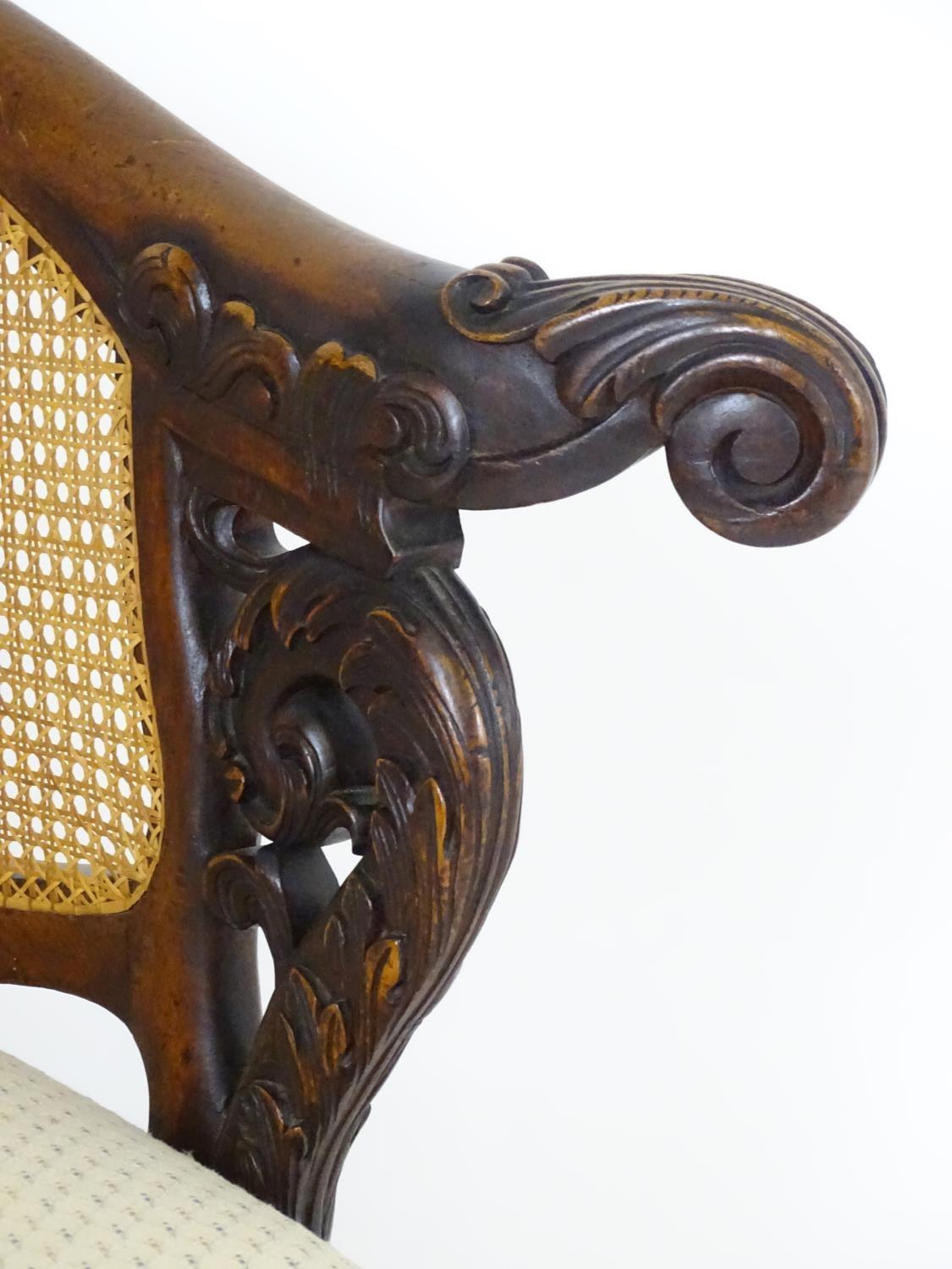 A 19thC mahogany Bürgermeister chairs with scrolled carved arms, double caned backrests and having - Bild 5 aus 6