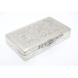 A Continental silver snuff box with engraved decoration and glided interior marked with Austrian /