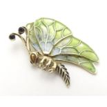 A 14ct gold pendant formed as a butterfly with plique a jour detail to wings. 1 1/2" long Please