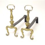 A pair of 19thC fire dogs of brass and iron construction. Approx. 16" long (2) Please Note - we do