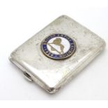 A silver plate match book case with enamel roundel to top ' British Empire Exhibition 1924' 2 1/4"