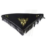 A Victorian black fringed shawl with floral embroidery. Please Note - we do not make reference to