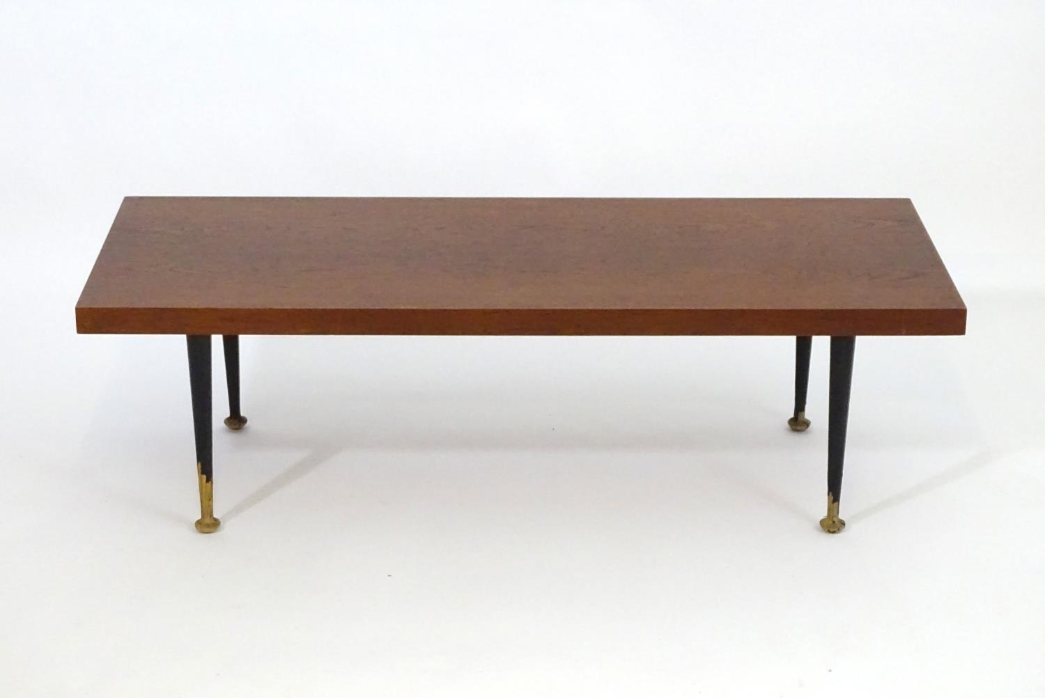 A mid 20thC Meredew coffee table with a rectangular teak top above four turned tapering legs. - Bild 4 aus 7