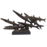 A 20thC limited edition bronze sculpture modelled as a shoal of barracuda fish. Signed Somchai and