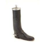 A 20thC table lighter modelled as a riding boot with a leather finish. Approx. 6 1/4" high Please