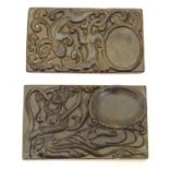 Two Chinese carved stone ink stones, one depicting a dancing figure, the other depicting stylised