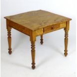 A mid / late 19thC elm kitchen table with a squared top above a single short drawer and four