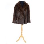 A vintage short length fur coat. Bust size 38" approx Please Note - we do not make reference to