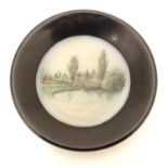 A 20thC oil on opaline glass landscape miniature depicting Bletchley Park from the lake. Titled