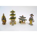 Four French hand painted ceramic items inspired by Japanese culture comprising two pagoda buildings,