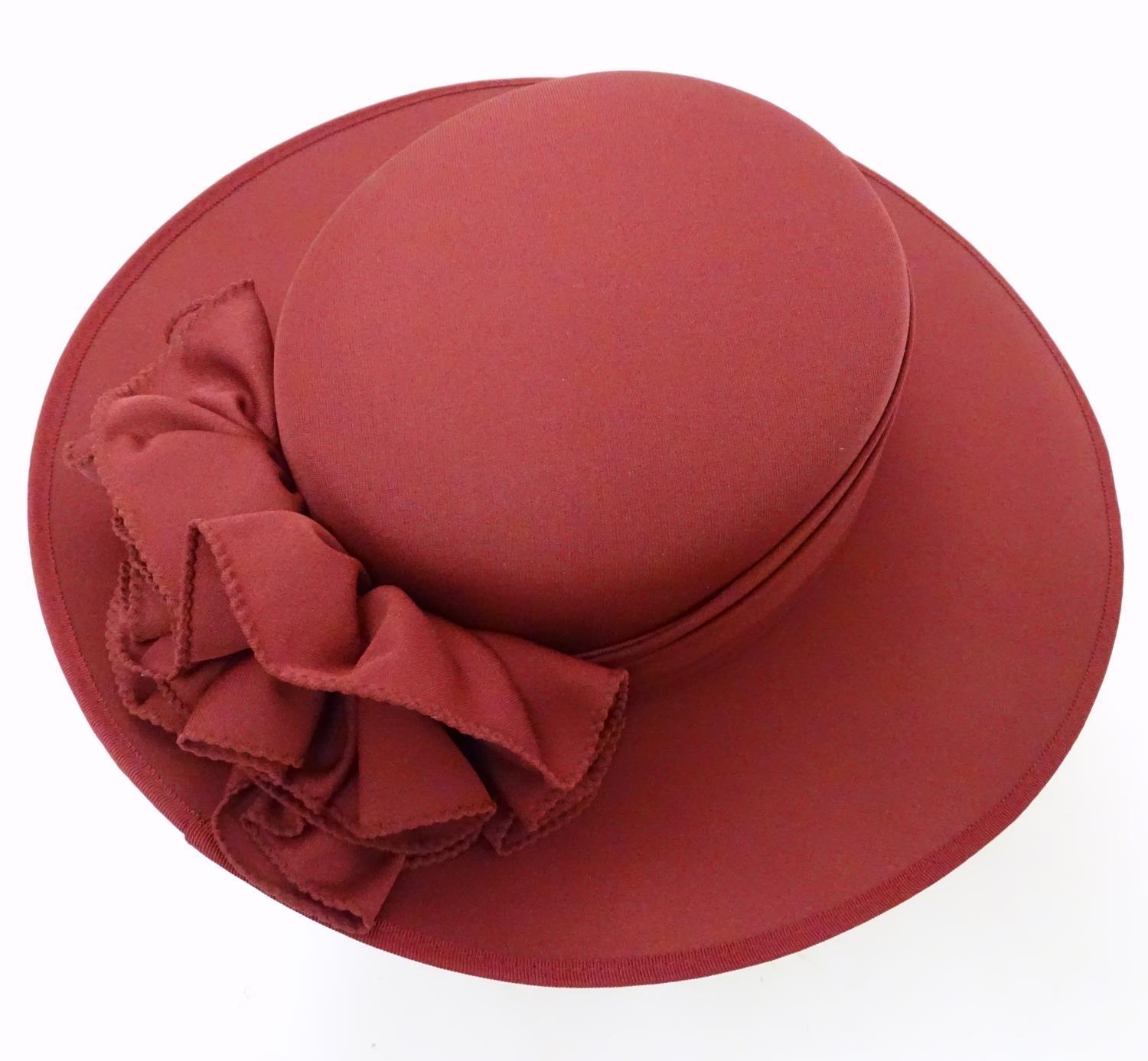 A ladies red hat by Kangol Please Note - we do not make reference to the condition of lots within - Image 6 of 7