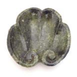 A Chinese carved soapstone dish formed as a stylised leaf with scroll detail. Approx. 4 3/4"