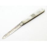 A silver folding fruit knife with mother of pearl handle having engraved decoration. Hallmarked