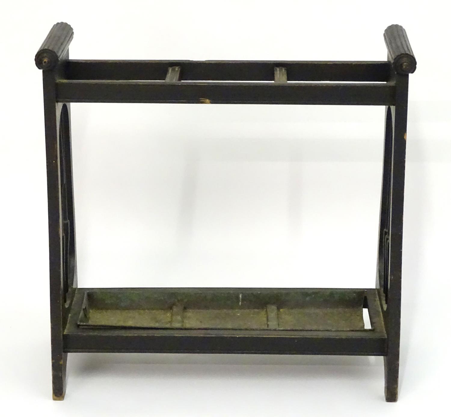 A 19thC Aesthetic movement stick stand with a three sectional centre, turned tapering spindles to - Image 2 of 5