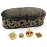 Militaria: a white metal mounted oval sewing container/pin cushion, containing a British Army