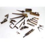 A large quantity of assorted vintage tools to include saws, hammers, chisels, files, spanners,