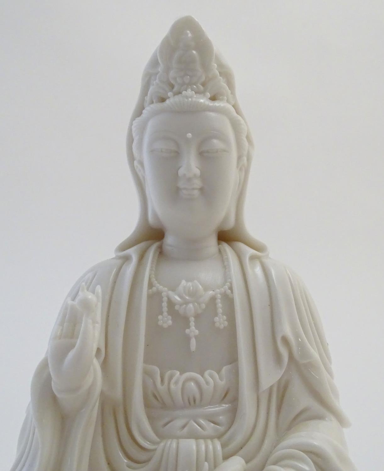 A Chinese blanc de chine figure depicting Guanyin seated on a lotus flower base. Approx. 7 1/2" high - Image 5 of 16