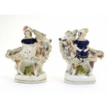 A pair of Staffordshire figures modelled as Queen Victoria?s children, the Princess Royal and the