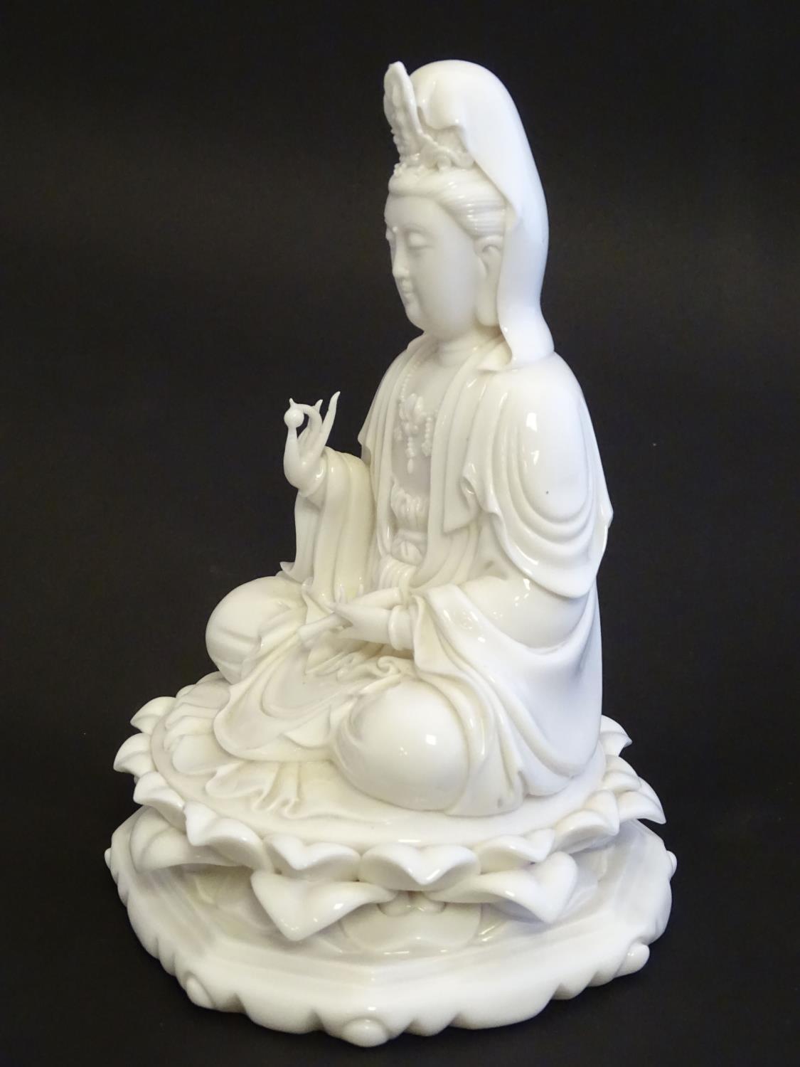 A Chinese blanc de chine figure depicting Guanyin seated on a lotus flower base. Approx. 7 1/2" high - Image 12 of 16