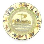 A Royal Doulton plate decorated with Bayeux Tapestry scenes with figures, horses and Norman ship,
